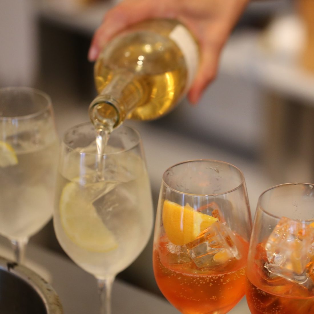 Two amber aperitivo spritzes